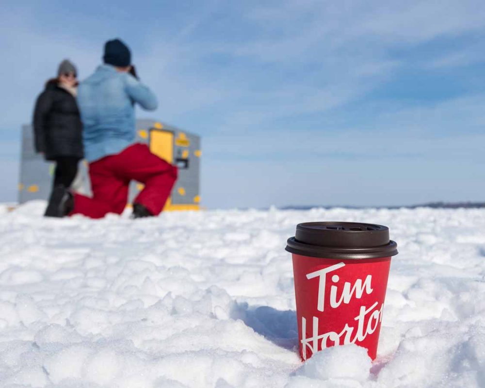 Tim Hortons Cup In Front Of Ice Fishing Hut in Durham County Ontario