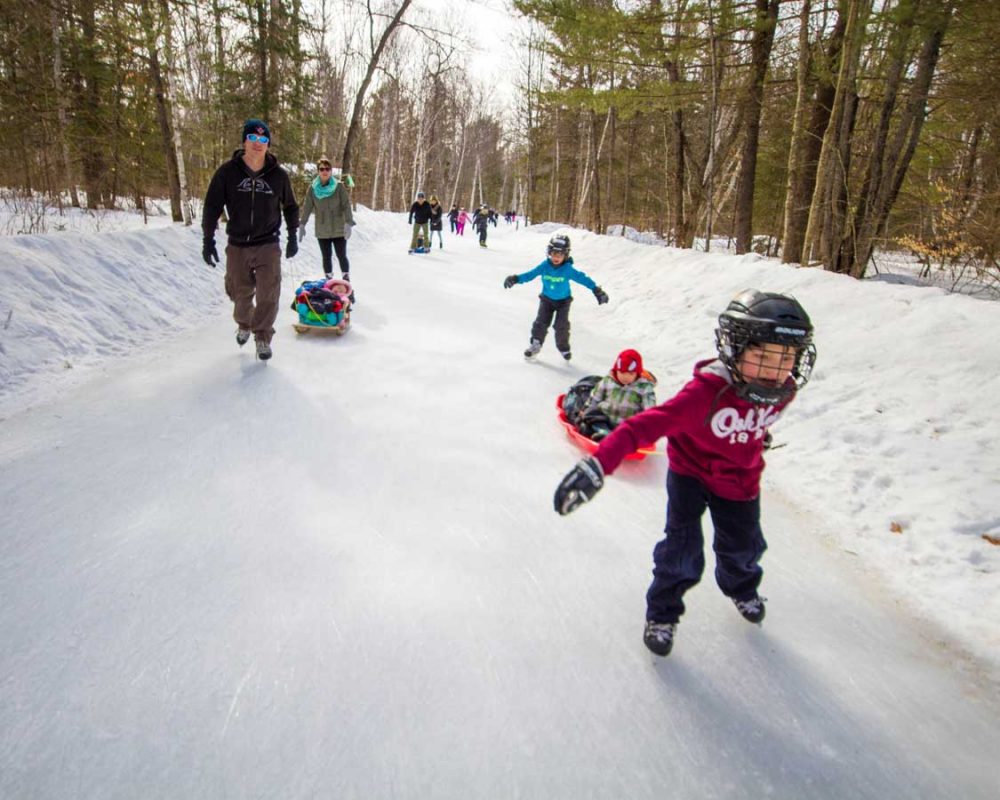 Families skating at MacGregor Provincial Park in Saugeen Shores