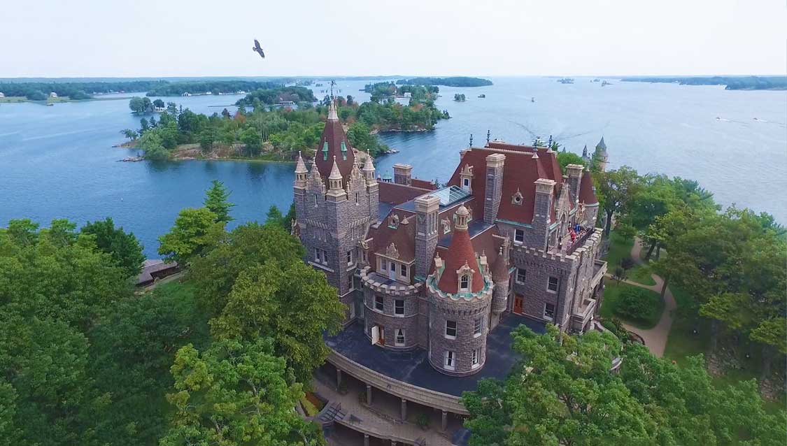 Aerial photo of a castle on an island in the St. Lawrence River