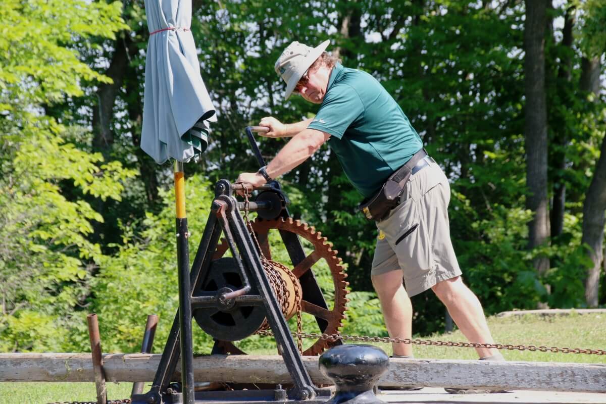 Parks Canada staff opening locks on Rideau Canal