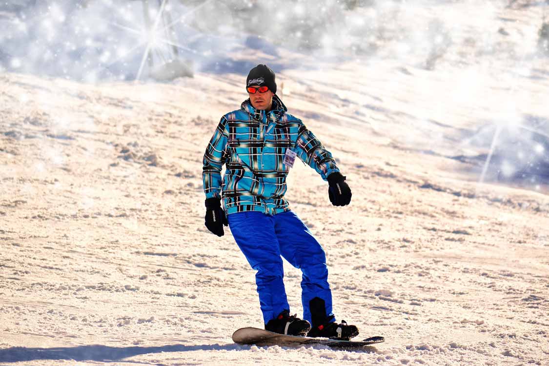 Man snowboarding in Barrie, Ontario