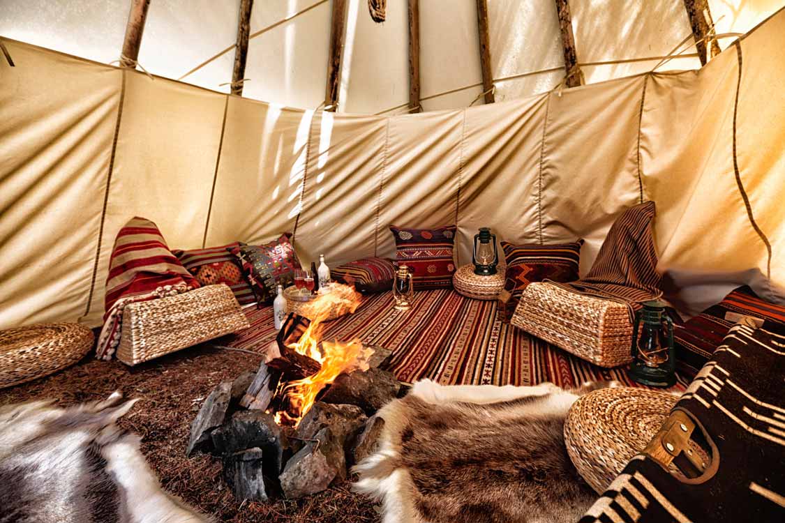 Beautiful rugs and furniture in an Ontario glamping tipi