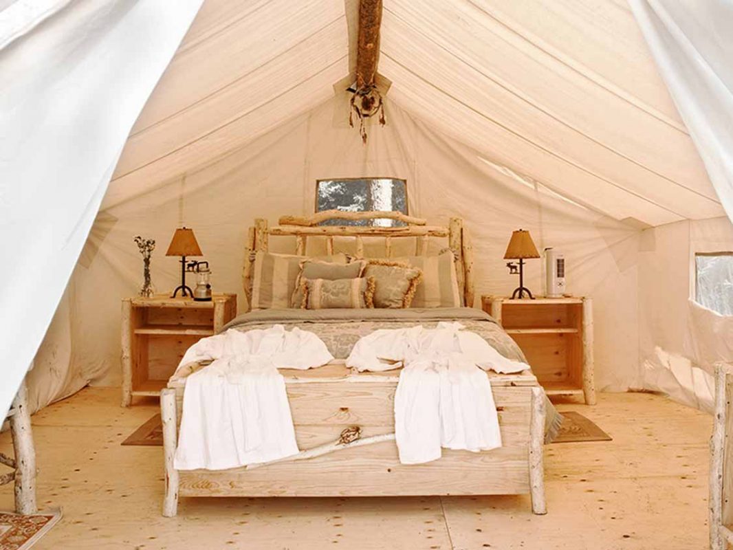 Beautiful glamping in Ontario bed at Wild Exodus retreat