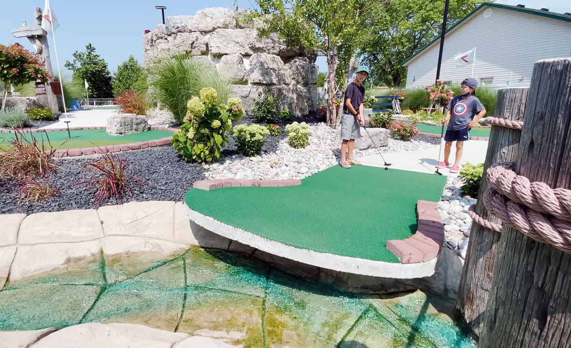 Children playing mini-golf at Ure's Country Kitchen