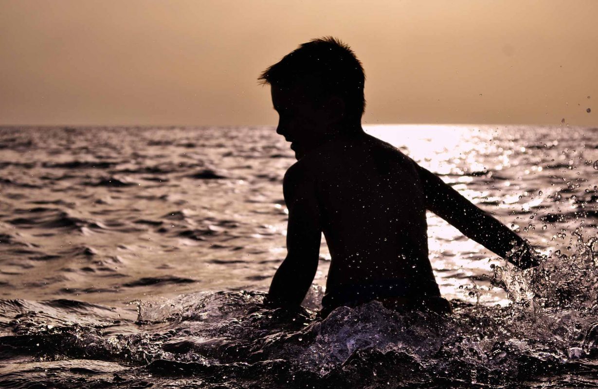 Boy swimming at Darlington Provincial Park