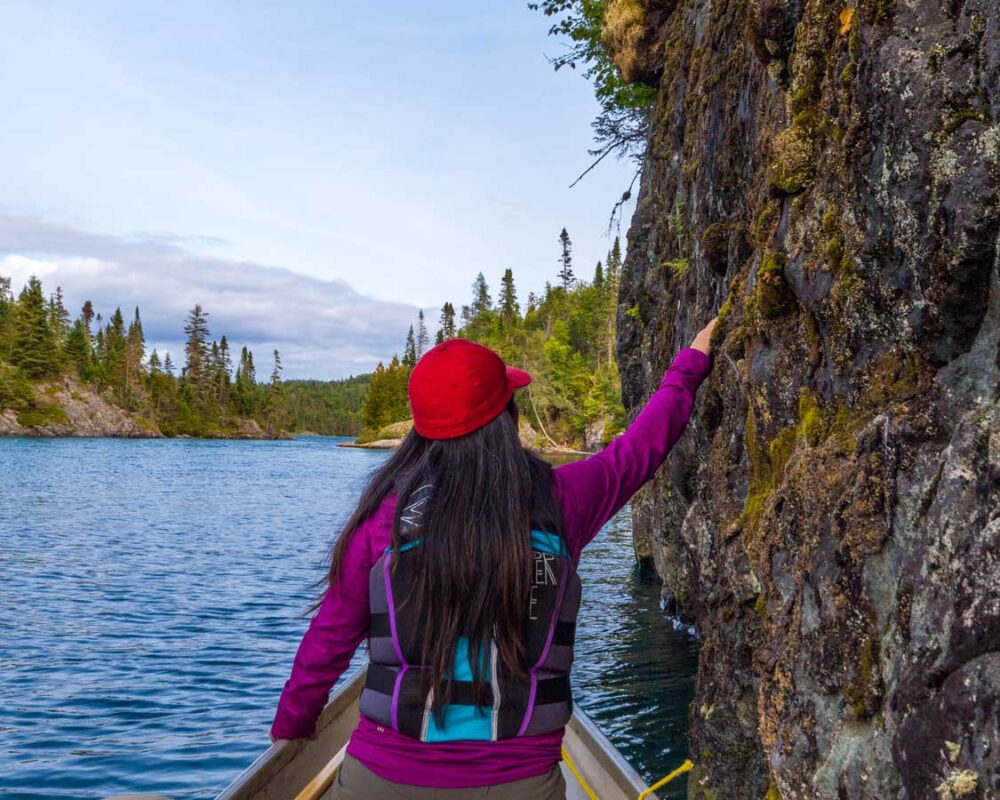 Woman canoeing in Pukaskwa National Park