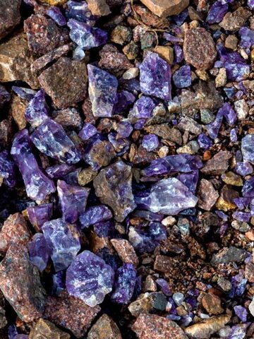A pile of amethyst in Thunder Bay mixed with quarry stones