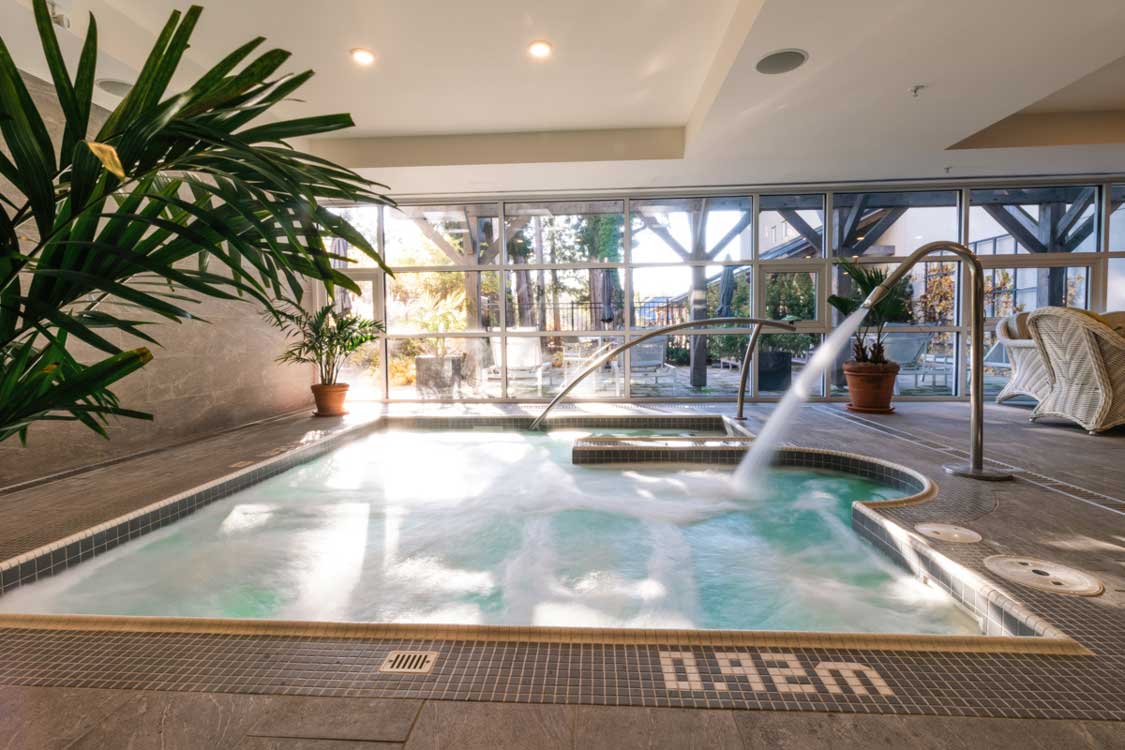 A pool with fountains in the spa at Langdon Hall