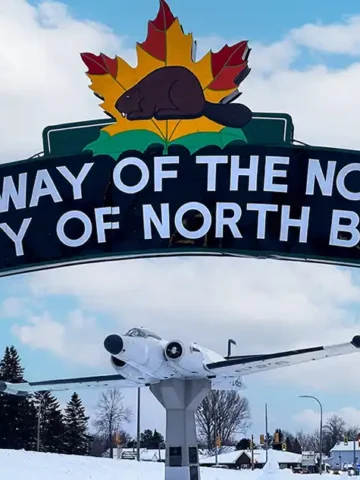 The Welcome To North Bay Sign in Lee Park During Winter