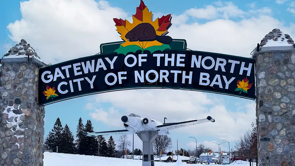 The Welcome To North Bay Sign in Lee Park During Winter