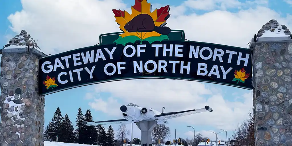 The Welcome To North Bay Sign in Lee Park During Winter